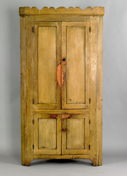 Appraisal: Pennsylvania painted poplar one piece corner cupboard early th c