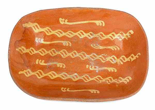 Appraisal: Massive Pennsylvania redware loaf dish th c with a three-line