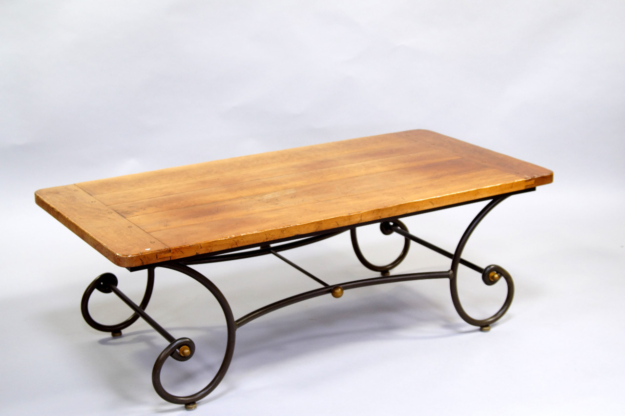 Appraisal: A Roman style chestnut plank top occasional table of rectangular