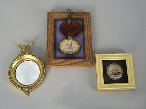 Appraisal: Miniature convex mirror together with a miniature watercolor equestrian portrait