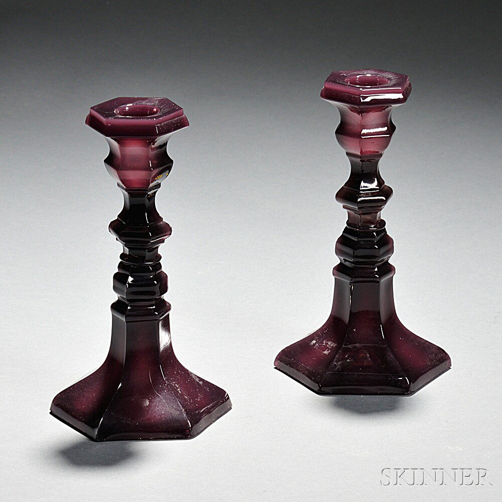 Appraisal: Pair of Amethyst Pressed Glass Candlesticks mid to late th