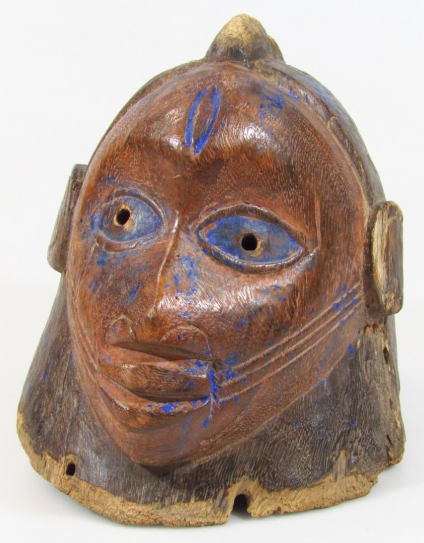 Appraisal: A carved tribal Yuraba wooden helmet mask with traces of