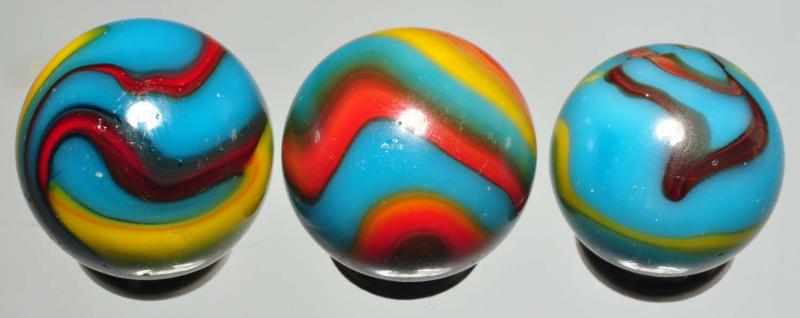 Appraisal: Lot of Peltier Superman Marbles Description Two have great color