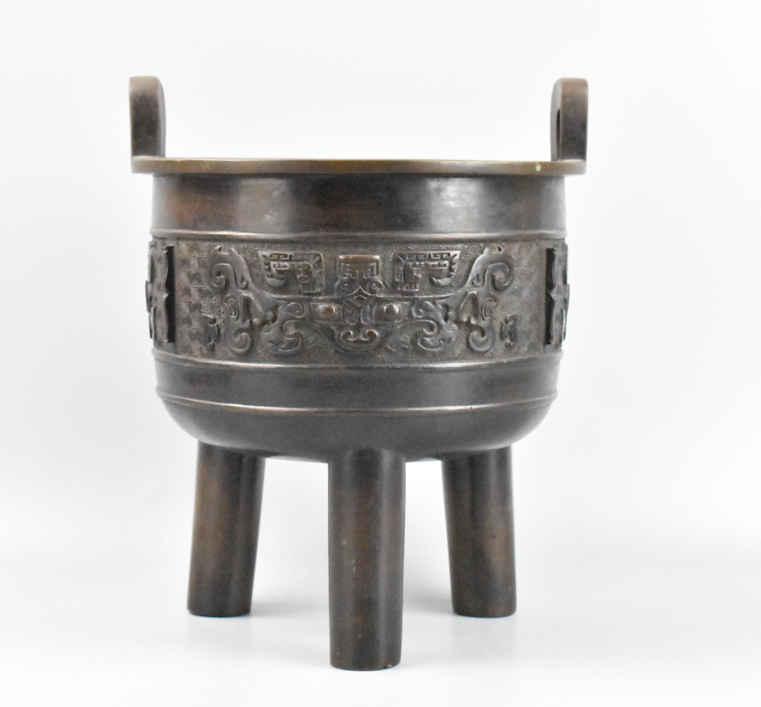 Appraisal: Chinese Qing Dynasty bronze tripod Ding Censer supported on three