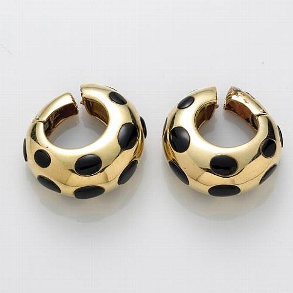 Appraisal: A pair of black onyx and k gold earclips gross