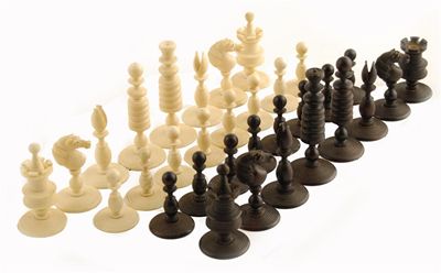 Appraisal: An English turned ivory chess set natural and stained to