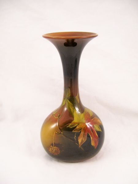 Appraisal: Rookwood Vase signed dark brown gloss glaze with a hand