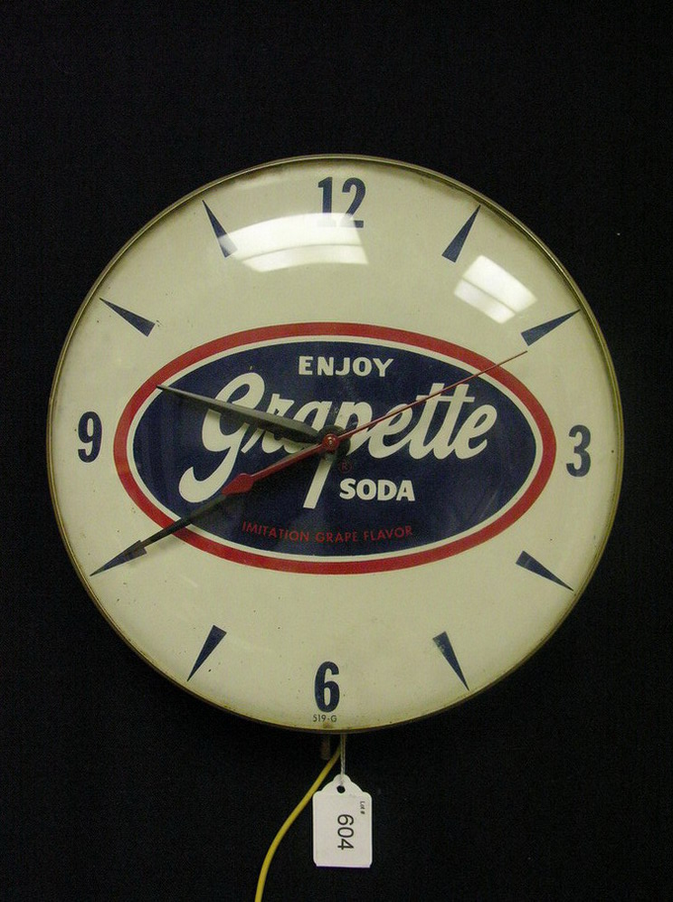 Appraisal: VINTAGE GRAPETTE CLOCK -G Original curved glass Painted good Size