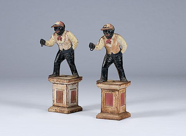 Appraisal: PAIR OF CAST IRON HITCHING JOCKEYS American th century Two