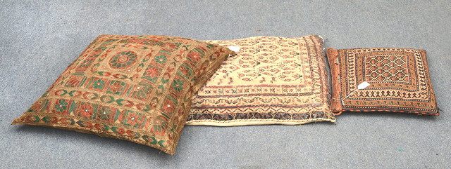 Appraisal: THREE EASTERN CUSHIONS one Indian with mirrored decoration two tribal