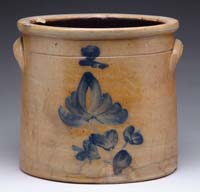 Appraisal: TWO GALLON STONEWARE CROCK WITH BLUE DECORATION Blue flower decoration