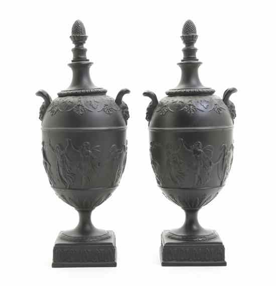 Appraisal: A Pair of Neoclassical Cast Metal Urns each of baluster