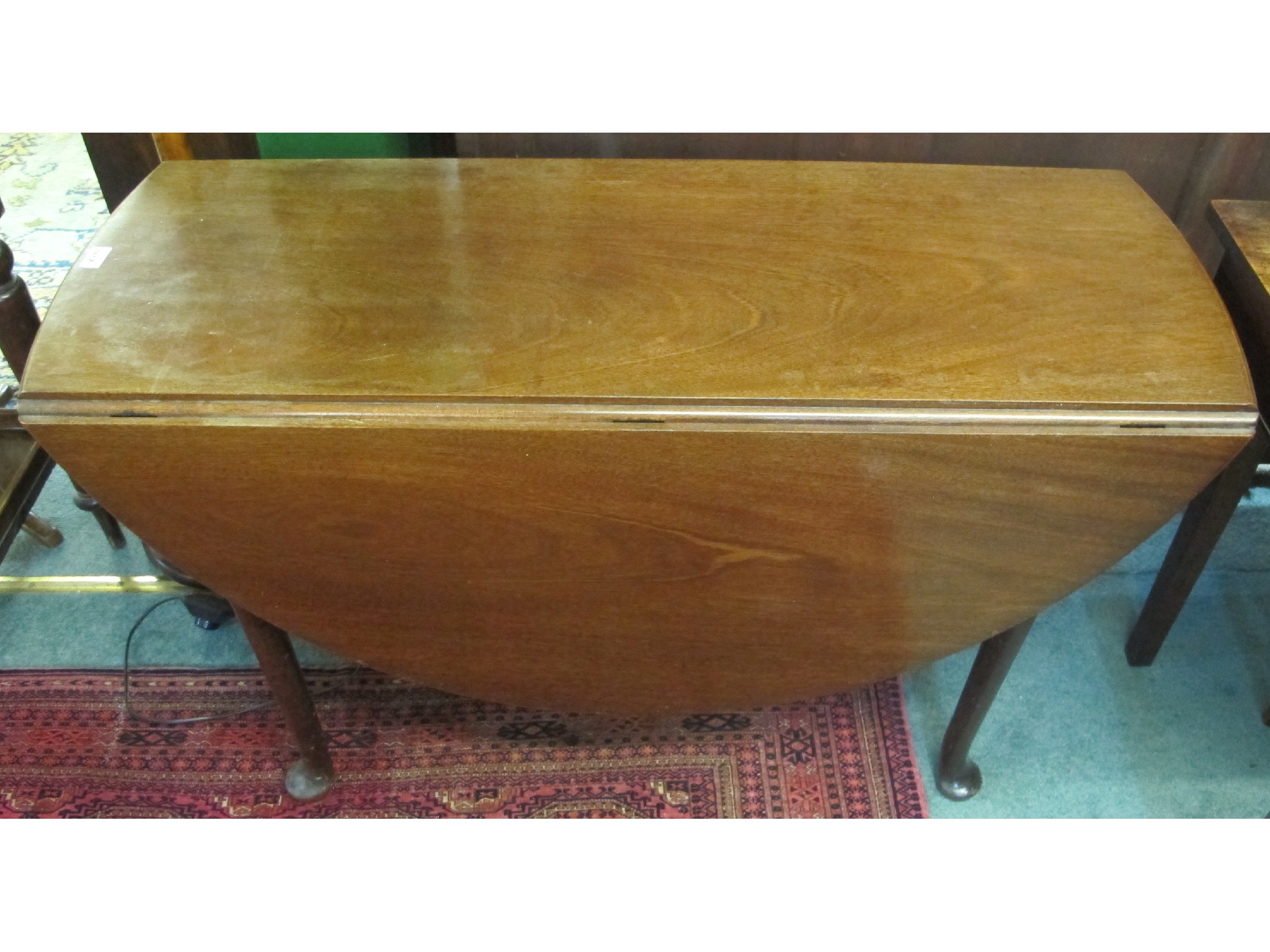 Appraisal: A mahogany drop end table