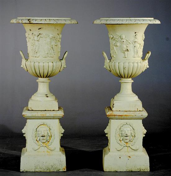 Appraisal: Pair painted cast-iron garden urns flaring lobed basins with Classical