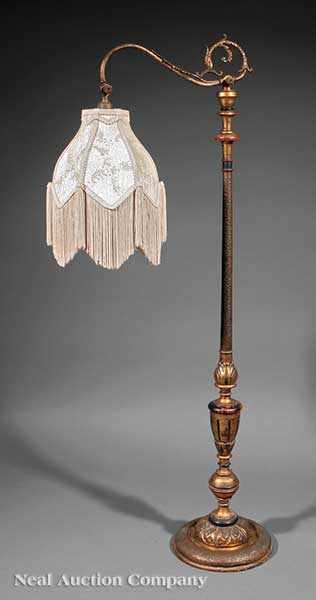 Appraisal: A Beaux Arts Carved and Polychromed Floor Lamp c adjustable