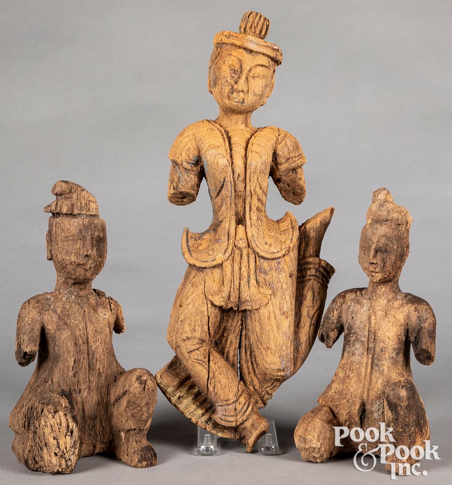 Appraisal: Three Thailand carved temple figures Three Thailand carved temple figures