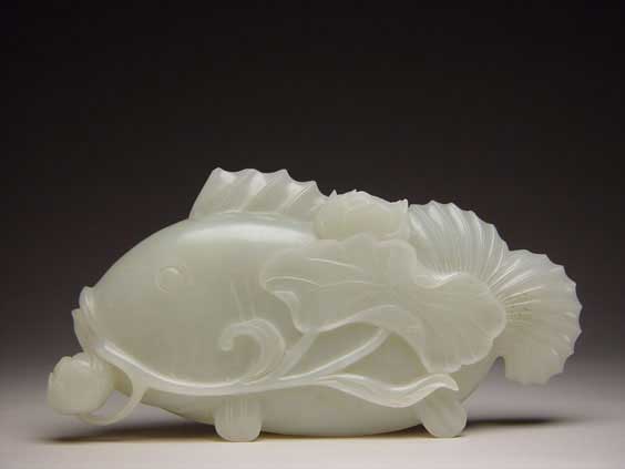 Appraisal: CARVED CELADON JADE FISH Well carved Chinese celadon jade model