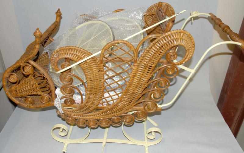 Appraisal: Wicker Baby Carriage With metal wheels Few minor wicker breaks