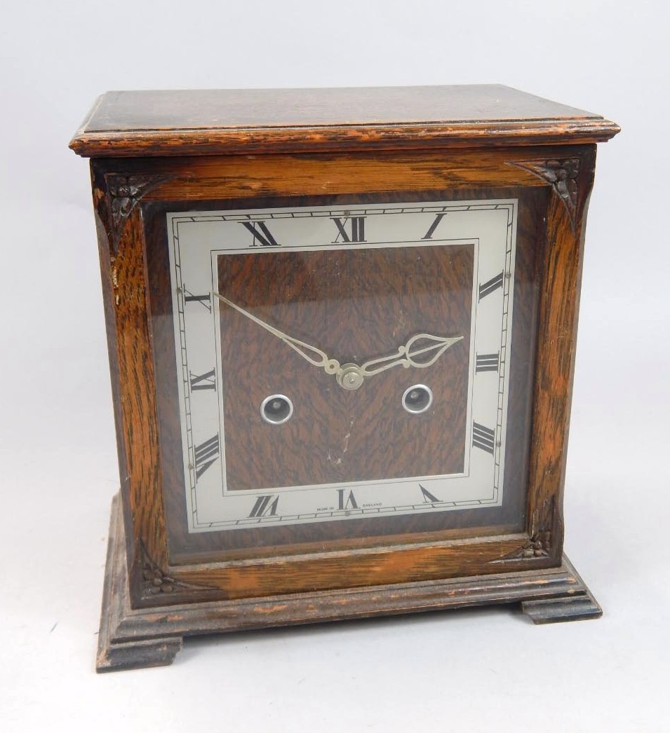 Appraisal: A mid- th oak cased mantel clock with square dial