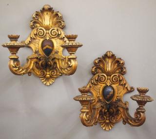 Appraisal: Pr Continental two A pair of Continental carved wood two-light