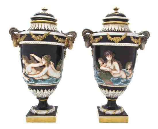 Appraisal: A Pair of Capodimonte Porcelain Urns each having ram mask