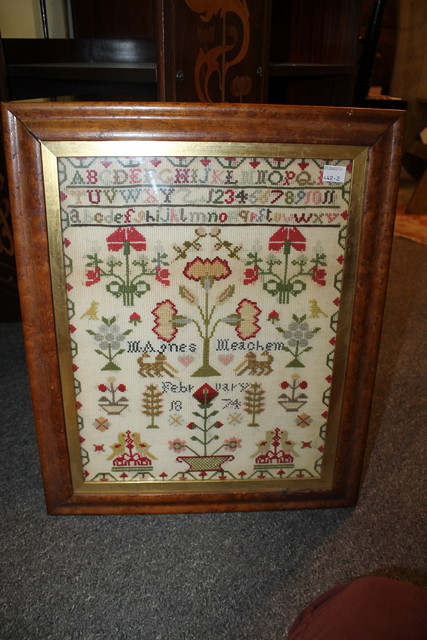 Appraisal: A TH CENTURY WOOL WORK SAMPLER dated in a maple