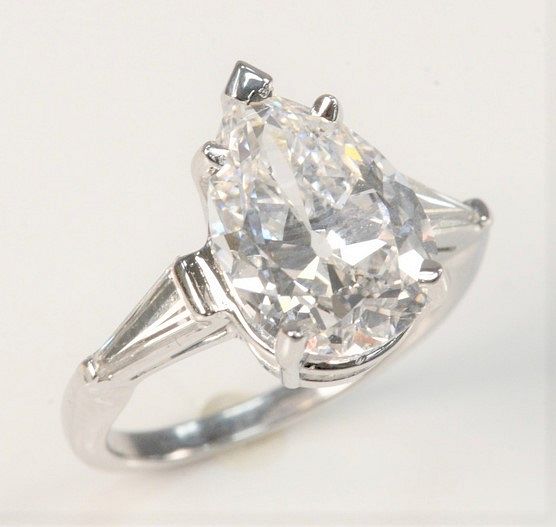 Appraisal: Platinum and Diamond Ring Set with Carat Pear Shaped Diamond