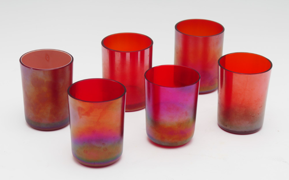 Appraisal: STEUBEN RED AURENE TUMBLERS Marked Steuben inside base iridescent red