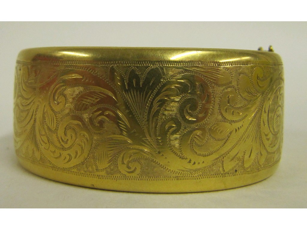 Appraisal: Yellow metal bangle