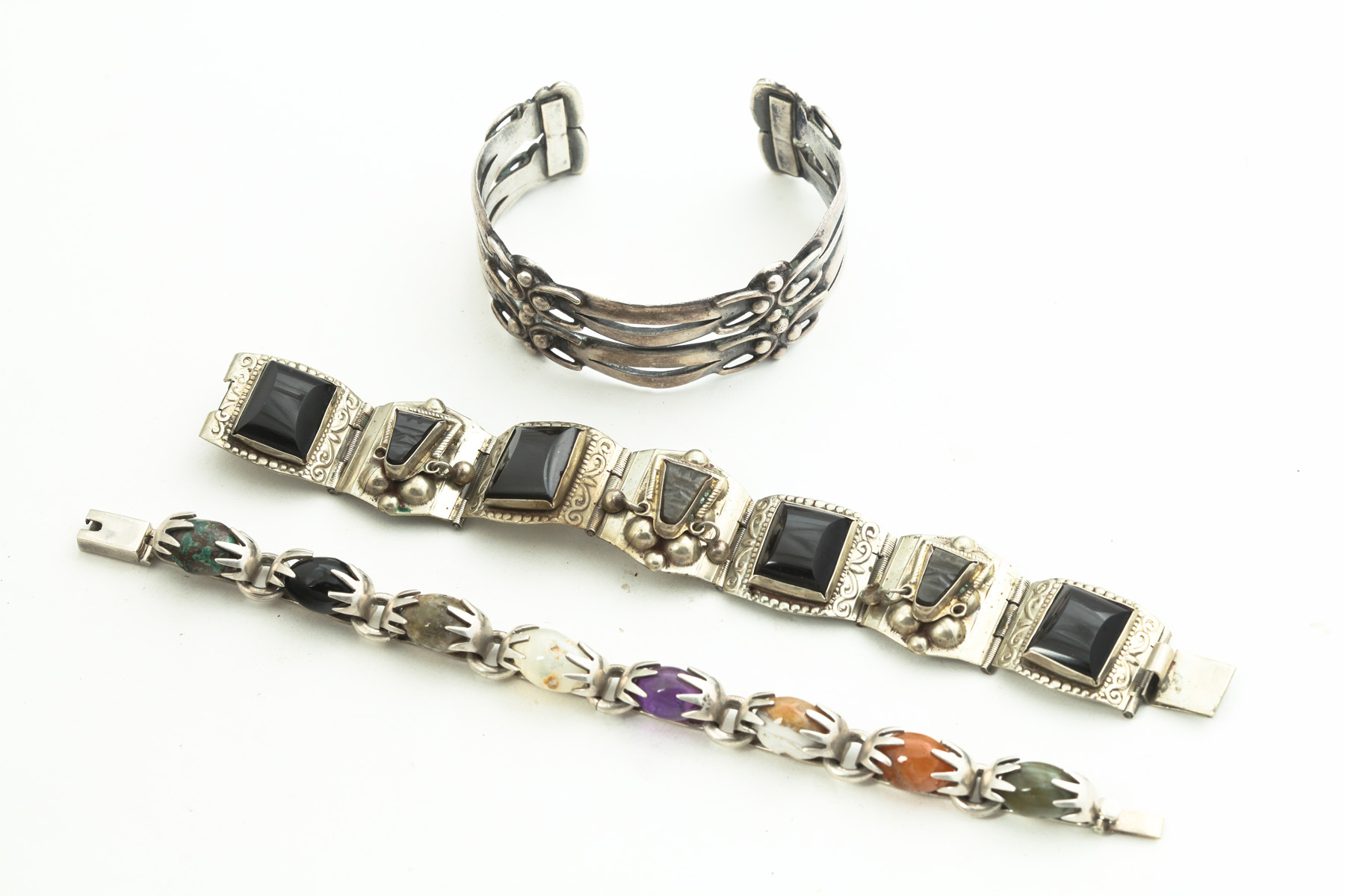 Appraisal: THREE SILVER BRACELETS INCLUDING MARCIELA Mexico mid th century Sterling