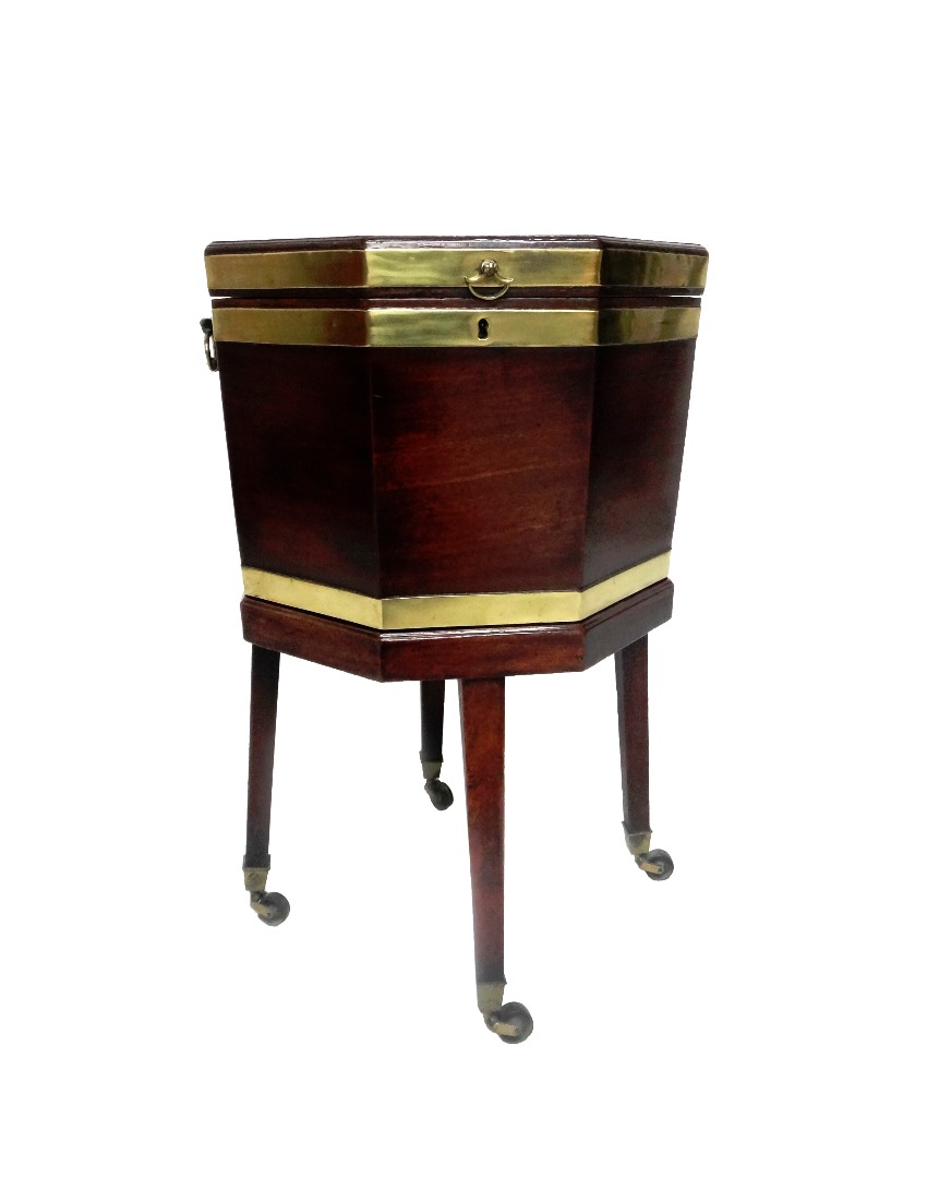 Appraisal: A George III brass bound mahogany octagonal wine cooler on