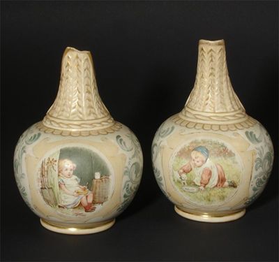 Appraisal: A pair of Doulton Carrara Ware ewers by Mark V