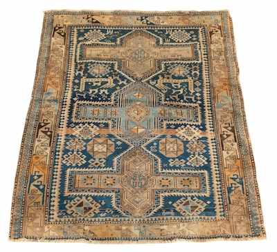 Appraisal: An Antique Caucasian Rug Tightly wove wool on wool weft