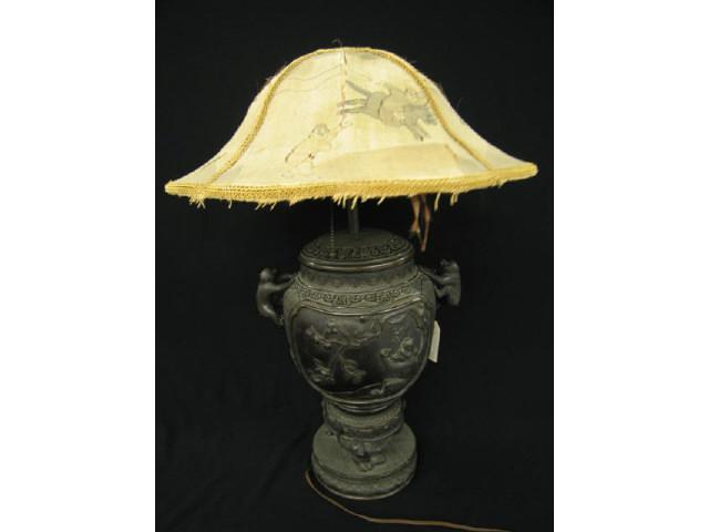 Appraisal: Japanese Bronze Lamp with Monkeys Meiji period figural handles and