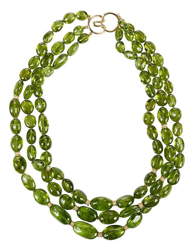 Appraisal: kt Diamond and Gemstone Necklace knotted peridot beads ranging from