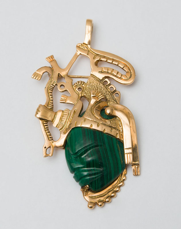 Appraisal: K GOLD AND MALACHITE BROOCH IN AN AZTEC MOTIF x