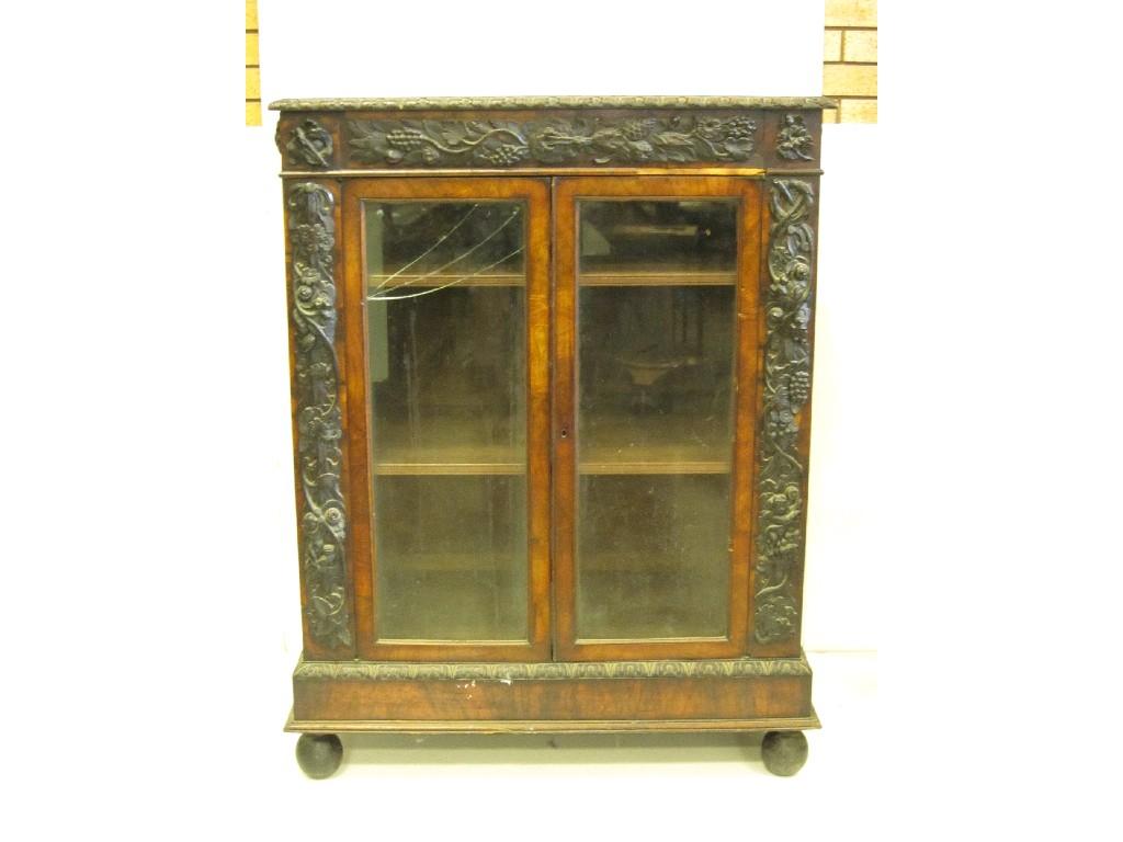 Appraisal: A Victorian walnut Cabinet with cross-banded top above pair of