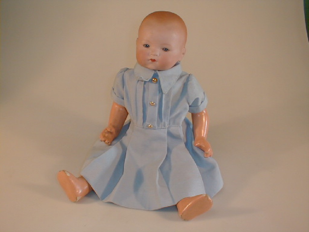 Appraisal: An Armand Marseille bisque head baby doll with sleeping blue