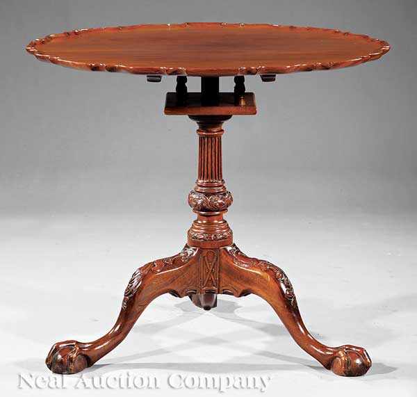 Appraisal: A Chippendale-Style Carved Mahogany Tilt-Top Tea Table piecrust top birdcage