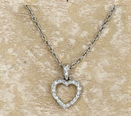 Appraisal: TIFFANY CO DIAMOND HEART PENDANT Platinum open heart set with