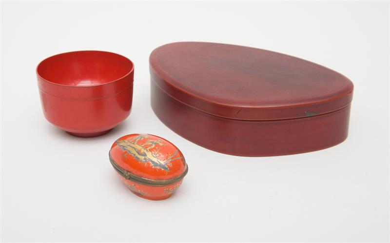 Appraisal: JAPANESE RED LACQUERED TEA BOWL AND A FRENCH PORCELAIN HINGED