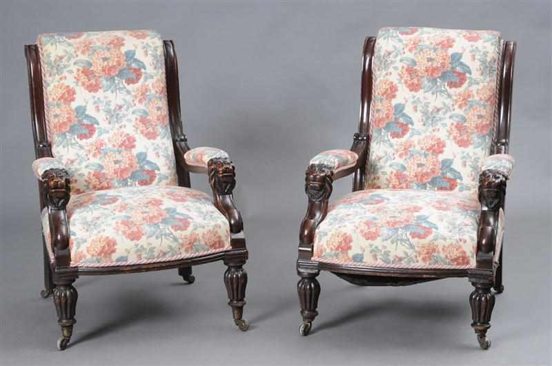 Appraisal: PAIR OF VICTORIAN CARVED MAHOGANY OPEN ARMCHAIRS Each padded spoon-shape