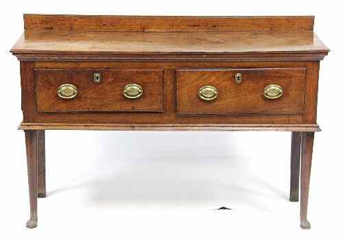 Appraisal: A small oak dresser fitted two drawers on round tapered