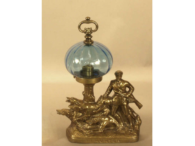 Appraisal: Bronze figural lamp of a hunter with his dogs and