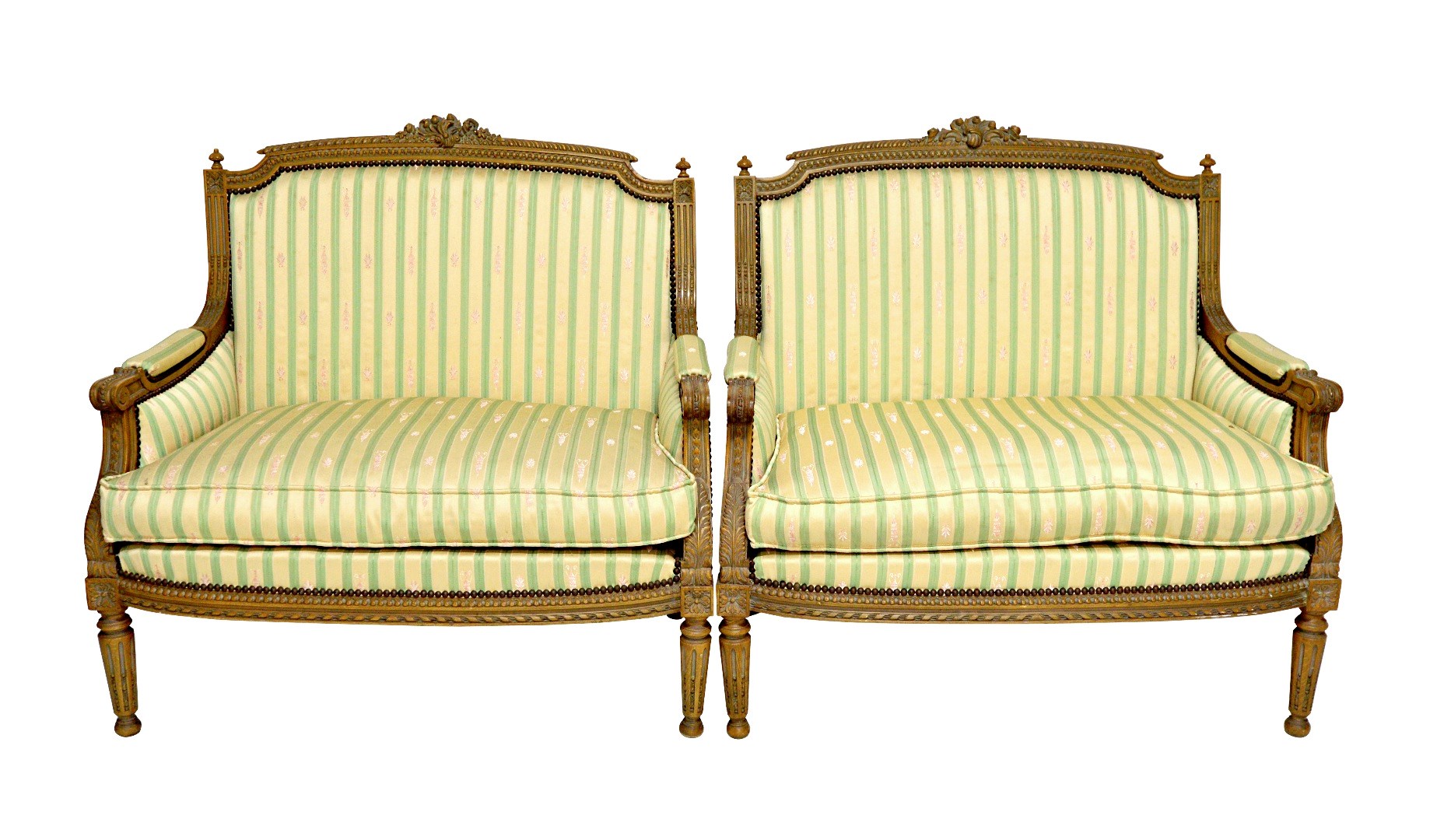 Appraisal: A matched pair of small beech framed sofas of Louis