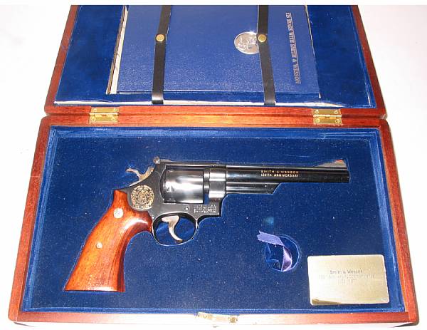 Appraisal: A cased Smith amp Wesson th Anniversary double action revolver