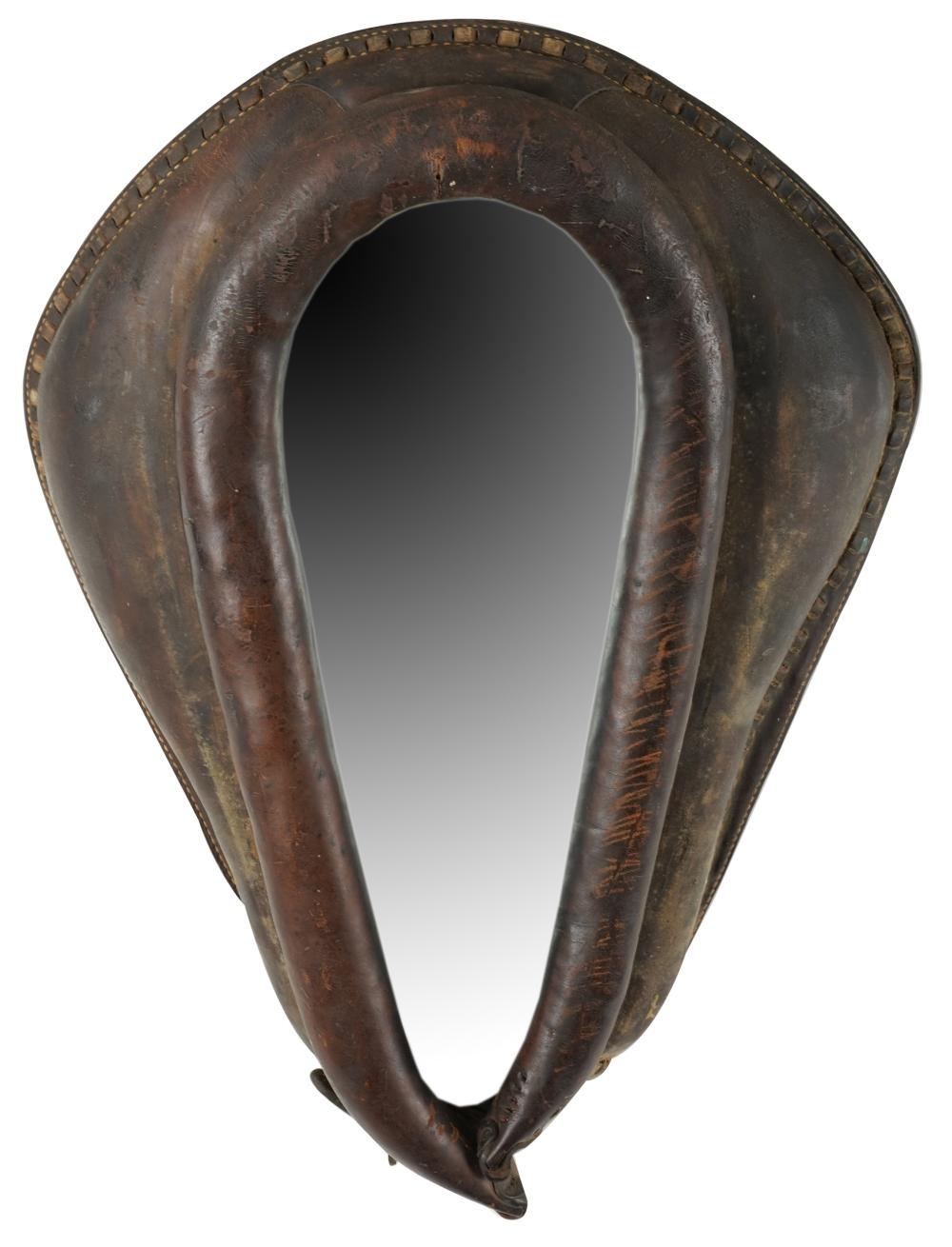 Appraisal: LEATHER-FRAMED MIRRORmade from a leather yoke or harness the glass