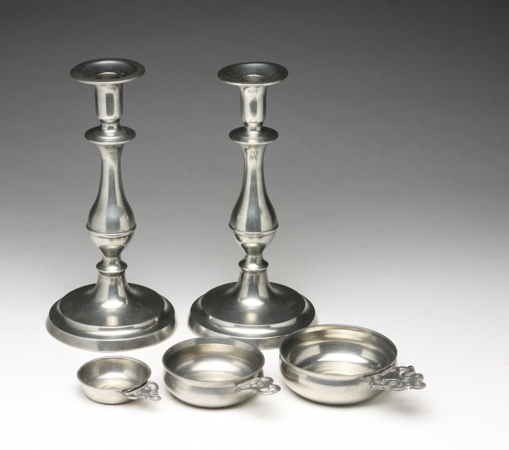 Appraisal: FIVE PIECES OF AMERICAN PEWTER Nineteenth century Unmarked Pair of