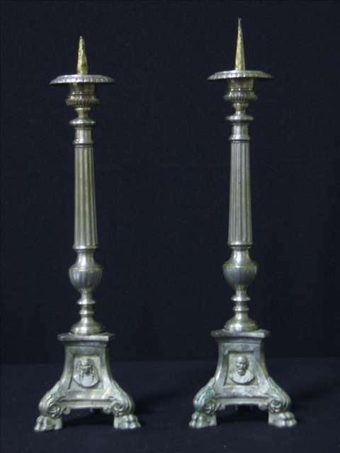 Appraisal: PAIR OF SILVERED METAL PRICKET STICKS With fluted columnar supports