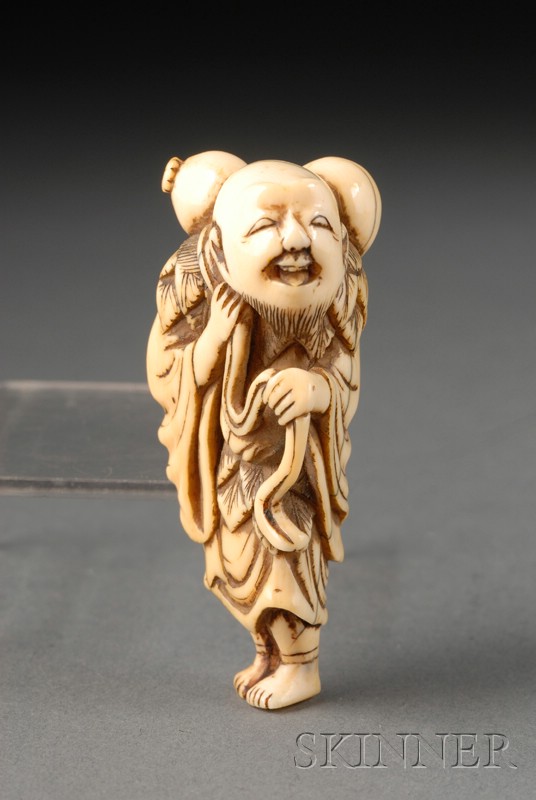 Appraisal: Ivory Netsuke Japan th century standing figure of a sennin